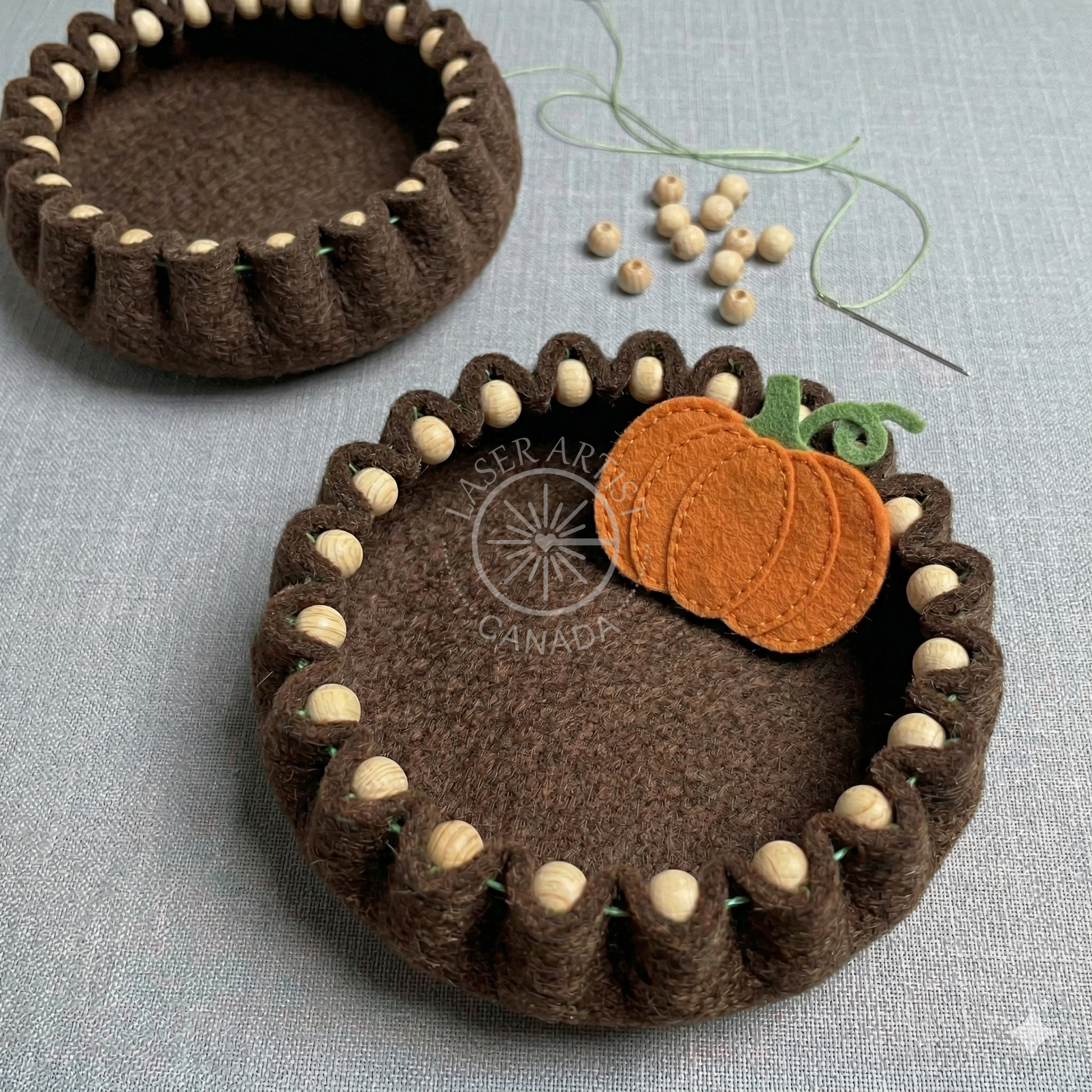 Thick wool felt materials and tools prepared for a fall craft class